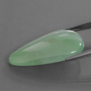 25.32カラットの天然グリーンジェダイト、ファンシー、透明
