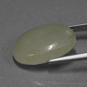 11.32カラットの天然緑ががかったイエロージェダイト、オーバルカット、半透明