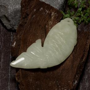 28.14カラットの天然ウォーム薄いグリーンジェダイト、ファンシーシェイプ、半透明