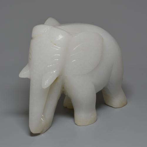 1311.99カラットの天然グレーがかったホワイトジェダイト、ファンシーシェイプ、オペーク