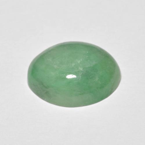 5.09カラットの天然アーシーグリーンヒスイ輝石（ジェダイト）（12.5×10.2 mm・オーバルカット）