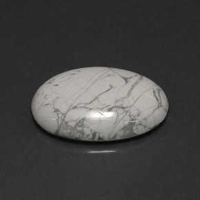 16.58カラットの天然マルチカラージャスパー（22.9×16.6 mm・オーバルカット）