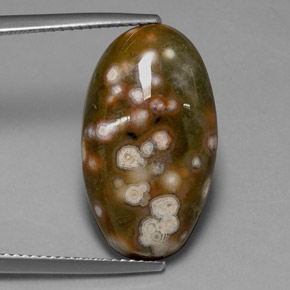 10.86カラットの天然マルチカラージャスパー（21.6×11.2 mm・オーバルカット）