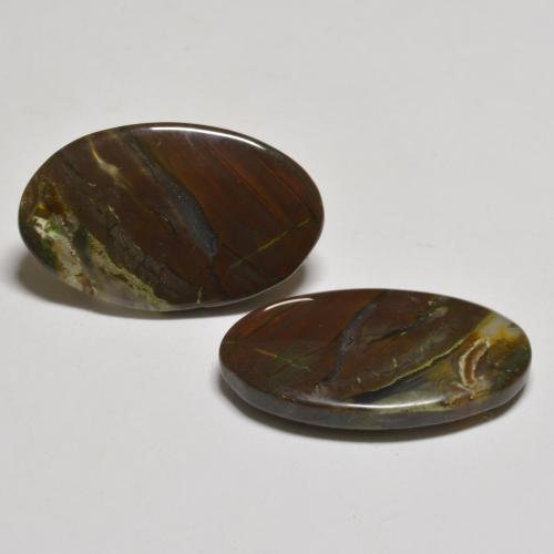 15.58カラットの天然マルチカラージャスパー（20.3x12.6 mm・オーバルカット）