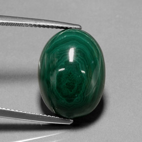22.99カラットの天然マルチカラーグリーンマラカイト（18.1×13.5 mm・オーバルカット）