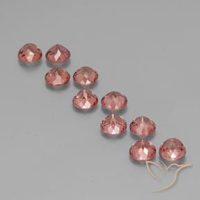 Shop natural 6.99ct ミディアムピンク マレーアン ガーネット gems, ラウンド, from タンザニア at GemSelect. In stock, global shipping!