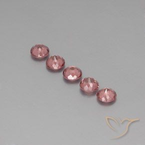 Shop natural 4.05ct ミディアムピンク マレーシア産ガーネット gems, ラウンド, from タンザニア at GemSelect. In stock, global shipping!