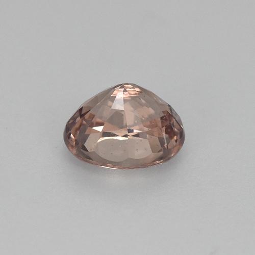 0.59カラットの天然オレンジマレーアン ガーネット（5.1×4.3 mm・オーバルカット）