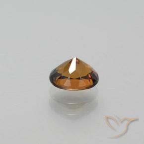 0.92カラットの天然Light Earth Orangeリトルガーネット、オーバルカット、VVS-VS