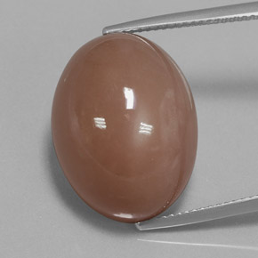 27.02カラットの天然ウォームブラウンムーンストーン、オーバルカット、オペーク