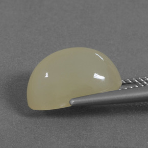 5.86カラットの天然ミディアムイエロームーンストーン、オーバルカット、半透明