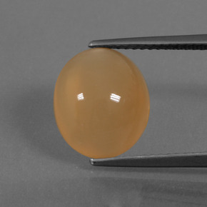 4.60カラットの天然ミディアム薄いオレンジムーンストーン、オーバルカット、半透明