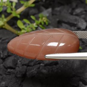 23.00カラットの天然ミディアムオレンジムーンストーン、ファンシーシェイプ、半透明