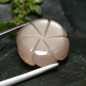 7.34カラットの天然ピーチオレンジムーンストーン、フラワーカット、半透明