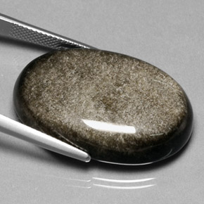 35.47カラットの天然ゴールドの輝き黒曜石、オーバルカット、オペーク