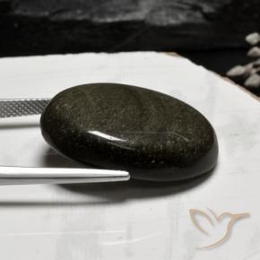 26.78カラットの天然薄い黒がかった茶色黒曜石、楕円形、オペーク