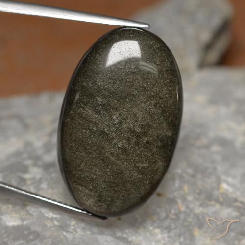 26.24カラットの天然ゴールドシーンのあるブラックオブシディアン（28.5×18.2 mm・オーバルカット）