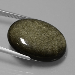 25.43カラットの天然ブラックゴールドシーン黒曜石、オーバルカット、オペーク