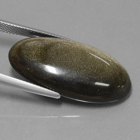 22.94カラットの天然ゴールドシーンオブシディアン（31.5×16.8 mm・オーバルカット）