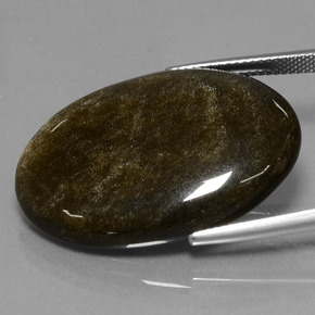 26.69カラットの天然ゴールドシーンオブシディアン（31.4×21.3 mm・オーバルカット）