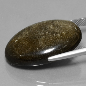 37.84カラットの天然ブラウン＆ブラックオブシディアン（31.4×21.7 mm・オーバルカット）