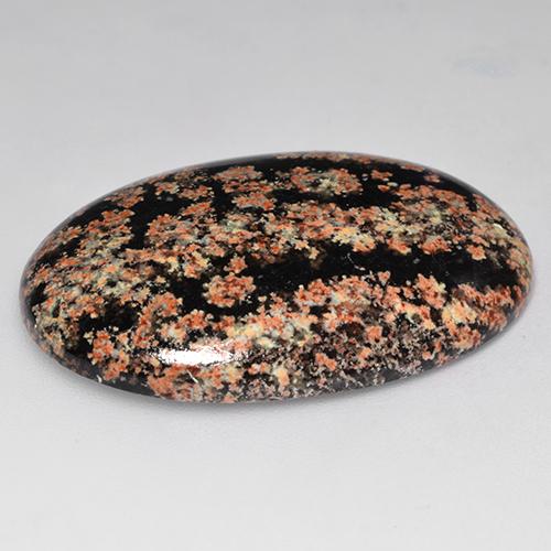 31.25カラットの天然マルチカラーオブシディアン（34×23.1 mm・オーバルカット）
