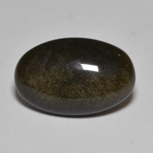 8.61カラットの天然ゴールドシーンのあるブラックオブシディアン（18.8×12.2 mm・オーバルカット）