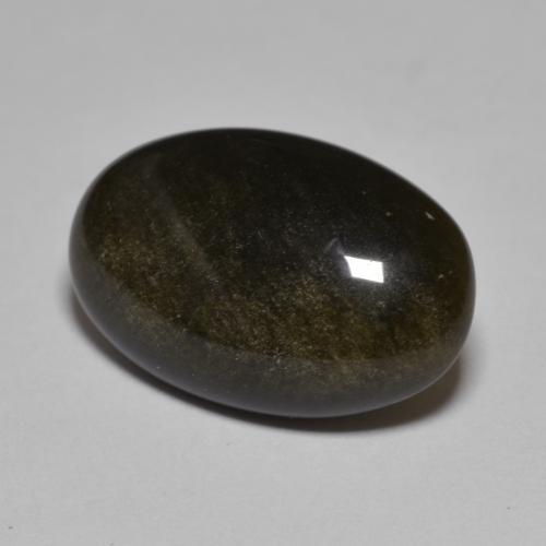 8.61カラットの天然ゴールドシーンのあるブラックオブシディアン（18.8×12.2 mm・オーバルカット）