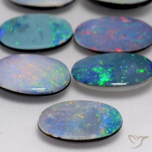 0.88カラットの天然マルチカラーダブレットオパール、楕円形、オペーク