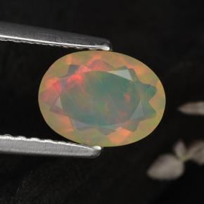 0.67カラットの天然イエローオパール（8×6 mm・オーバルカット）