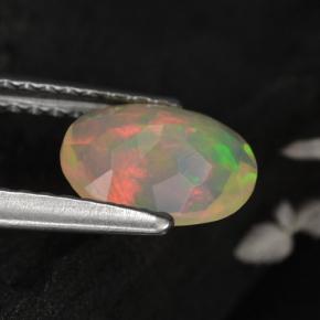 0.67カラットの天然イエローオパール（8×6 mm・オーバルカット）