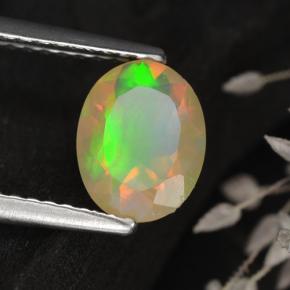 0.75カラットの天然マルチカラーオパール（8.1×6.3 mm・オーバルカット）