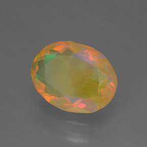 1.29カラットの天然マルチカラーオパール（9.7×7.5 mm・オーバルカット）