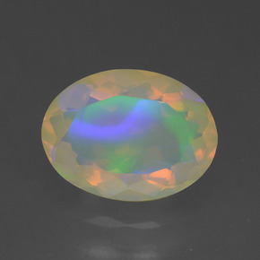 1.64カラットの天然マルチカラーオパール（10.6×7.8 mm・オーバルカット）