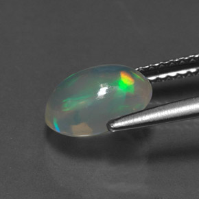 1.28カラットの天然マルチカラーオパール（9×6.9 mm・オーバルカット）