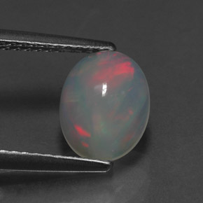 1.24カラットの天然マルチカラーオパール（9×7.1 mm・透明）