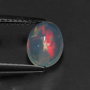 1.01カラットの天然マルチカラーオパール（8×6.1 mm・オーバルカット）