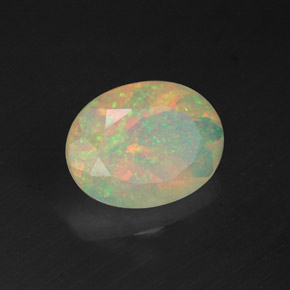 1.26カラットの天然マルチカラーオパール（9.2×7.1 mm・透明）
