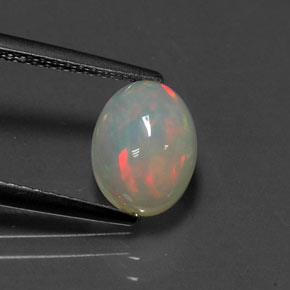 1.38カラットの天然マルチカラーオパール（9×7 mm・透明）