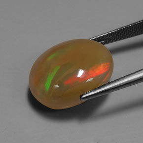 9.93カラットの天然マルチカラーオパール（16.6×14.6 mm・オーバルカット）