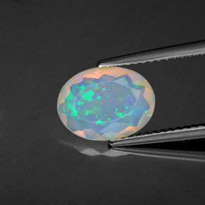 1.22カラットの天然マルチカラーオパール（10.7×8 mm・オーバルカット）