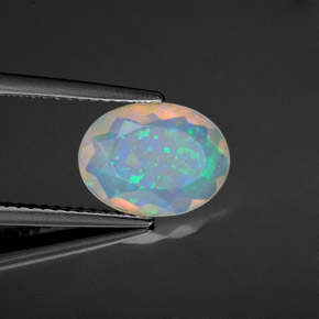 1.22カラットの天然マルチカラーオパール（10.7×8 mm・オーバルカット）