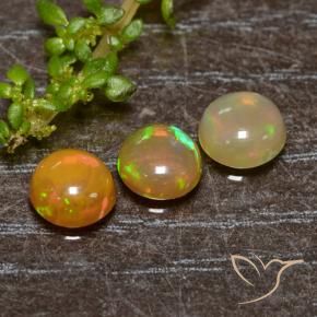 Shop natural 1.34ct マルチカラー オパール gems, ラウンド, from エチオピア at GemSelect. In stock, global shipping!