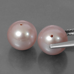 6.69カラットの天然オレンジピンクパール（7.88 mm・球体 / ボール）