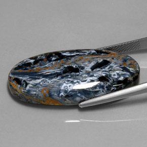 37.75カラットの天然マルチカラーピーターサイト、オーバルカット、オペーク