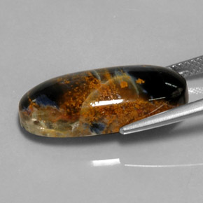 10.81カラットの天然マルチカラーピーターサイト、オーバルカット、オペーク