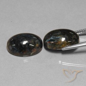 Shop natural 12.84ct ブラック ピーターサイト gems, 楕円形, from 中国 at GemSelect. In stock, global shipping!