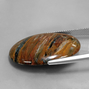 21.99カラットの天然マルチカラーピーターサイト、オーバルカット、オペーク