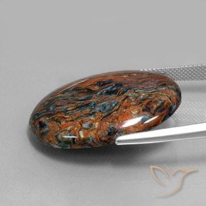 26.24カラットの天然マルチカラーピーターサイト、オーバルカット、オペーク