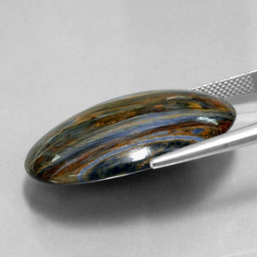 30.29カラットの天然マルチカラーピーターサイト、オーバルカット、オペーク